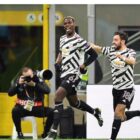 Paul Pogba mengantarkan Manchester United melewati AC Milan menuju perempat final Liga Europa setelah golnya
