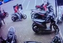 Orang yang tidak di kenal, melakukan aksi pencurian Marka Jalan di parkir milik kantor jasa pengiriman