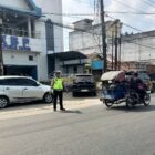 Gelar Kekuatan di Hari Minggu: Sat Lantas Polres Batu Bara Berikan Rasa Aman Selama Ibadah.